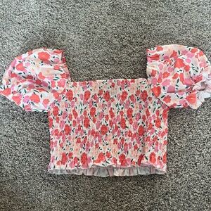 Pink floral stretch top with puffy shoulders
